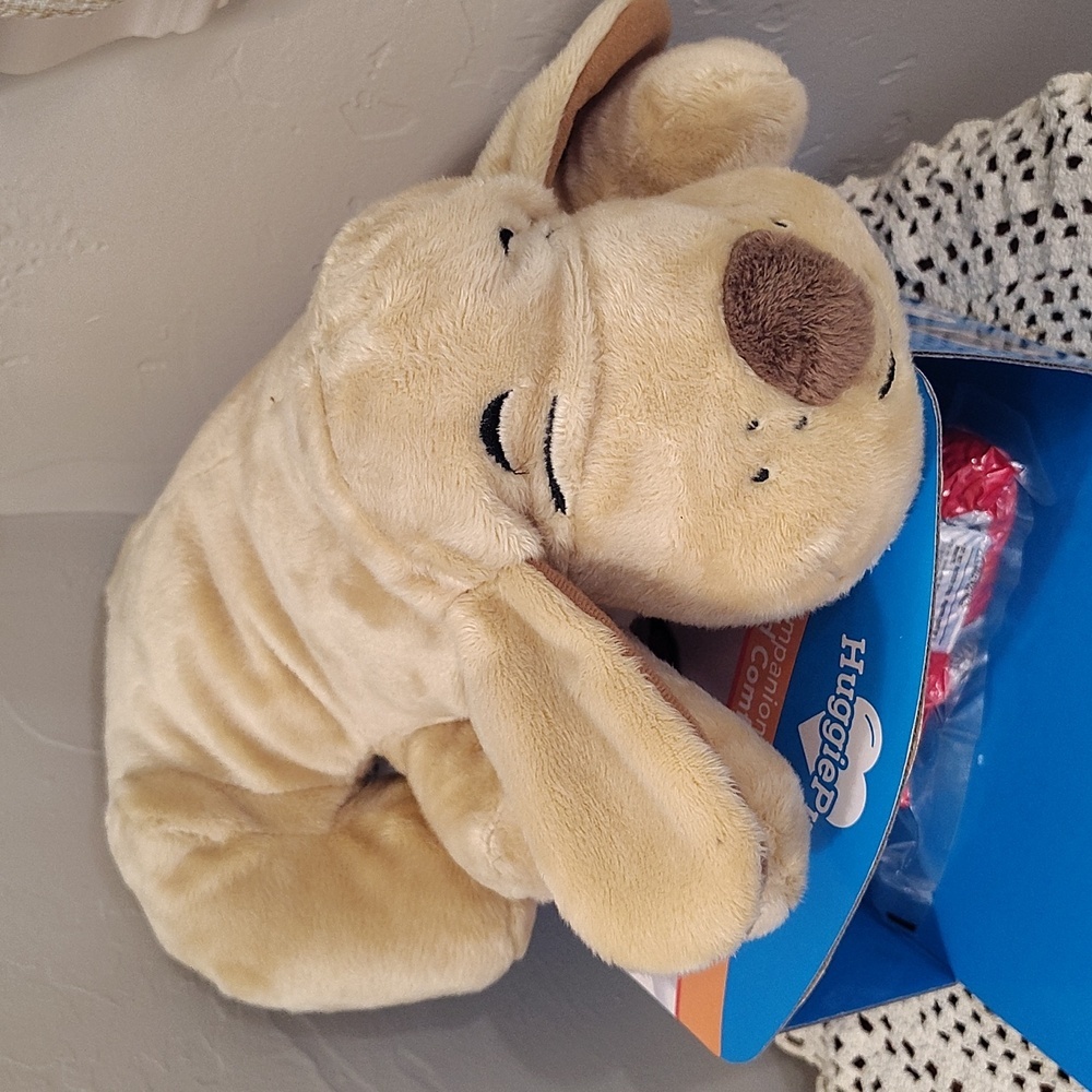 The HuggiePup is a cuddly behavioral aid toy Heartbeat Heatpack